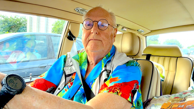 Who IS that man in that car?