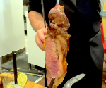 Sliced meat with Caipirinha