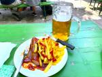 A Curry Wurst and chips