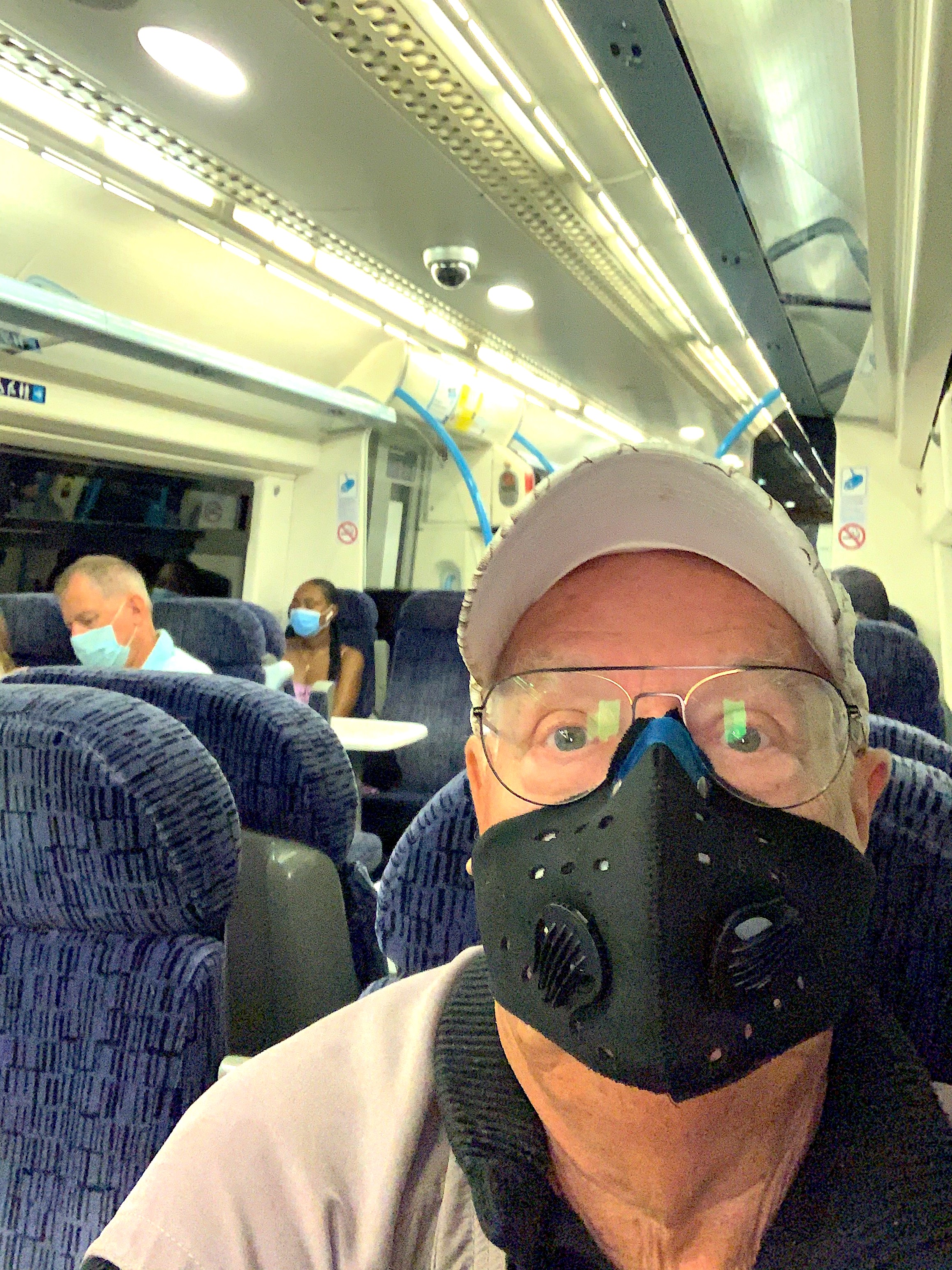 Mad masked man on train